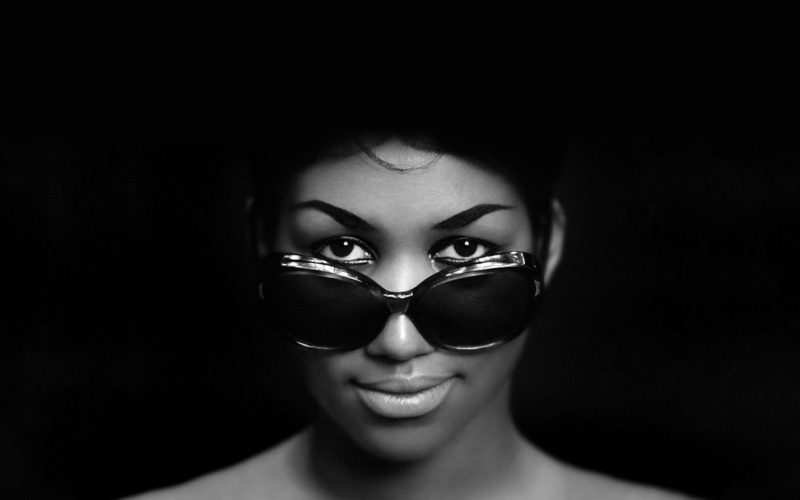 Aretha Franklin wearing sunglasses