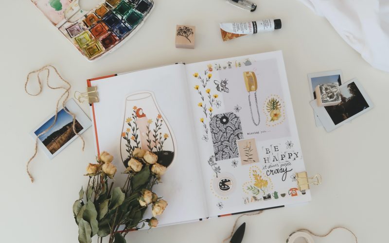 A visual journal with images and mixed media for creative journalling